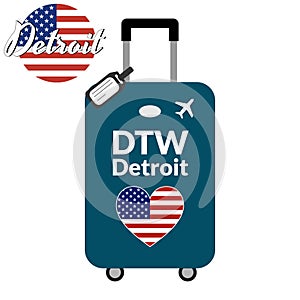 Luggage with airport station code IATA or location identifier and destination city name Detroit, DTW. Travel to the