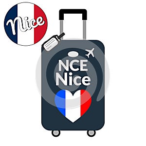Luggage with airport station code IATA or location identifier and destination city name Nice, NCE. Travel to France