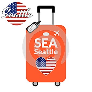 Luggage with airport station code IATA or location identifier and destination city name Seattle, SEA. Travel to the