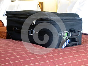 Luggage in hotel room