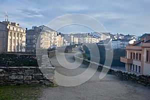 LUGO,SPAIN January,27,2024: Walking along the Roman wall of Lugo