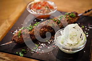 Lula kebab with tomato salsa