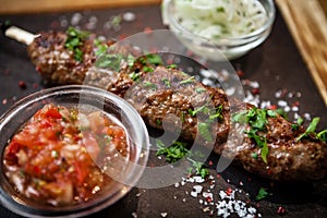 Lula kebab with tomato salsa