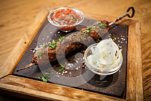 Lula kebab with tomato salsa