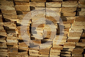 Lumber stacked in a bundle at a construction site