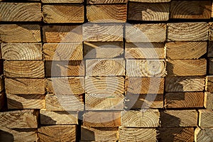 Lumber stacked in a bundle at a construction site