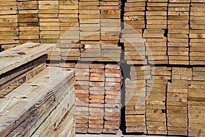 Lumber stacked and ready for home and commercial construction