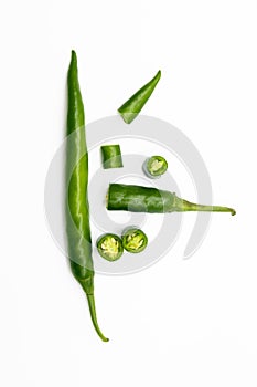 Lumbre green chili pepper slices isolated on white background photo