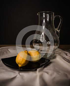 Luminous Citrus Reverie: Vase, Lemon, and Linen