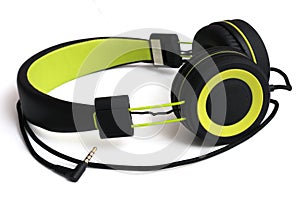 A luminous green and black wired headphone set