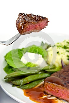 Lump of Roast Beef with green Beans photo