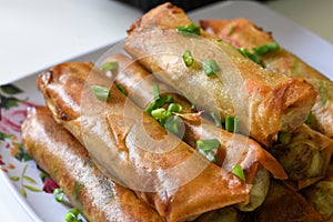 Lumpiang Shanghai with sprinkled spring onions.