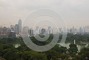 Lumpini Park with skyscrapers, Bangkok city, Thailand