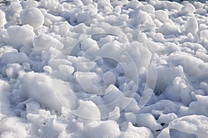 Lumps of snow and ice frazil on the surface of the freezing rive