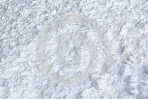 Lumps of snow illuminated by light