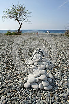 luna beach smooth rock piles