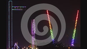 Lunapark at night in the bright lights in AyiaNapa. 4K Timelapse.