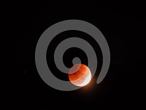 Lunar Eclipse showing Blood Moon beginning November 2022 photo