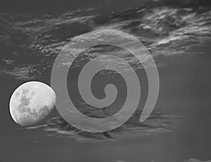 Lunar eclipse whit clouds in blue hour