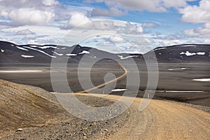 Lunar landscape with desert dirt road in Highlands of Iceland