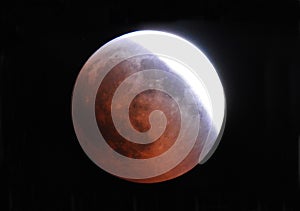 Red lunar Moon eclipse in the sky