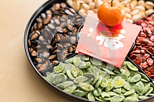 Lunar new year snack box, citrus fruit with red packet