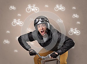 Lunatic cyclist with bike on the background