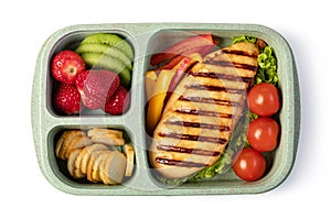 Lunch box with delicious food on a white background