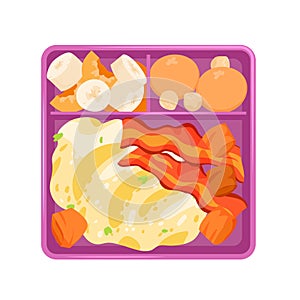 Lunch box with food, divided plastic tray with fruit and cookies, omelet with fried bacon