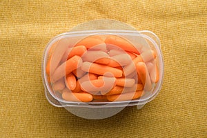 Lunch box with healthy snacks. Plastic container with carrots vegetables closeup