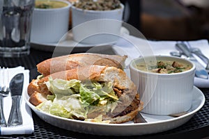 Lunch combo included sandwich and soup. Outside. Business lunch for two.
