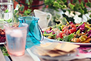 Lunch with grilled chicken , mango and spring mix salad in the balcony