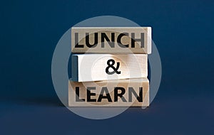 Lunch and learn symbol. Wooden blocks with concept words Lunch and learn. Beautiful grey background, copy space. Business,