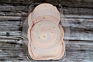 Lunch meats, cold cuts, luncheon cooked sliced cold delicatessens deli chicken meats, precooked or cured meats that are sliced and photo