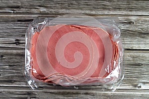 Lunch meats, cold cuts, luncheon cooked sliced cold delicatessens deli beef meat, precooked or cured meats that are sliced and photo
