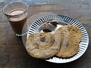 Lunch Plate Puri Pindi Choley Phirni and Aloo Bhindi Sabji Lokgram Kalyan