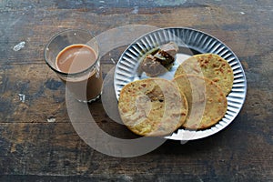 Lunch Plate Puri Pindi Choley Phirni and Aloo Bhindi Sabji Lokgram Kalyan