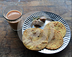 Lunch Plate Puri Pindi Choley Phirni and Aloo Bhindi Sabji Lokgram Kalyan