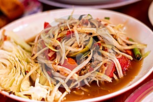 The lunch of Thai food papaya salad,Som Tum,spicy flavor on the table