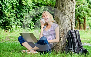 Lunch time relax or coffee break. Work in summer park. Nature is essential to wellbeing and ability to be productive