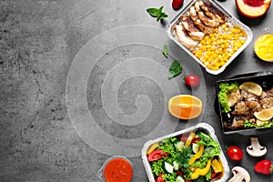 Lunchboxes on grey table. Healthy food delivery