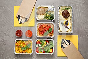 Lunchboxes on grey table. Healthy food delivery