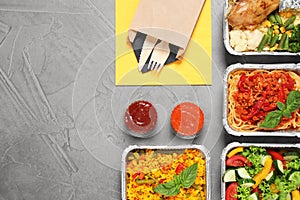 Lunchboxes on grey table. Healthy food delivery