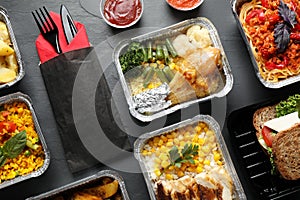 Lunchboxes on grey table. Healthy food delivery