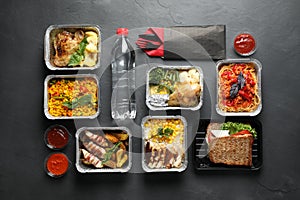 Lunchboxes on grey table. Healthy food delivery