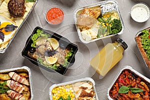 Lunchboxes on grey table. Healthy food delivery