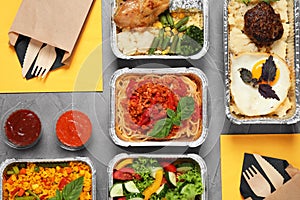 Lunchboxes on grey table. Healthy food delivery