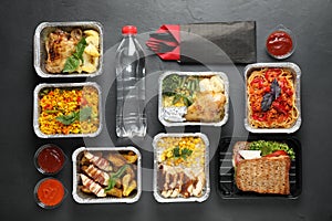 Lunchboxes on grey table. Healthy food delivery