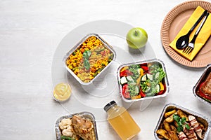 Lunchboxes on white wooden table. Healthy food delivery
