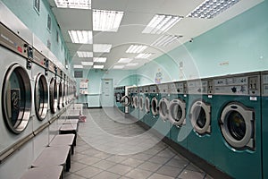 Lunderette with washmachines. Green Color.